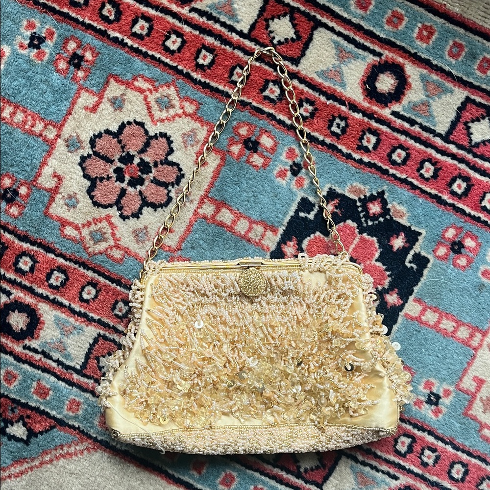 Gold beaded small evening clutch with chain by Inge Christopher